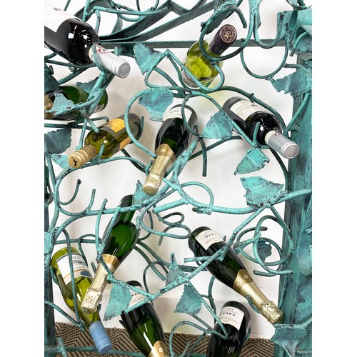 212 - N. M. KENNEDY SCULPTURED WINE RACK, scrolling grapevine metal work, in painted Verdigris finish, sig... 