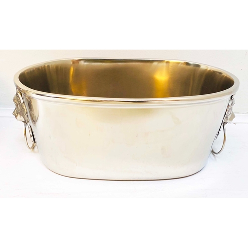 432 - CHAMPAGNE BUCKETS, a pair, polished meal with lion's head handles, 16cm H x 45cm x 26cm. (2)