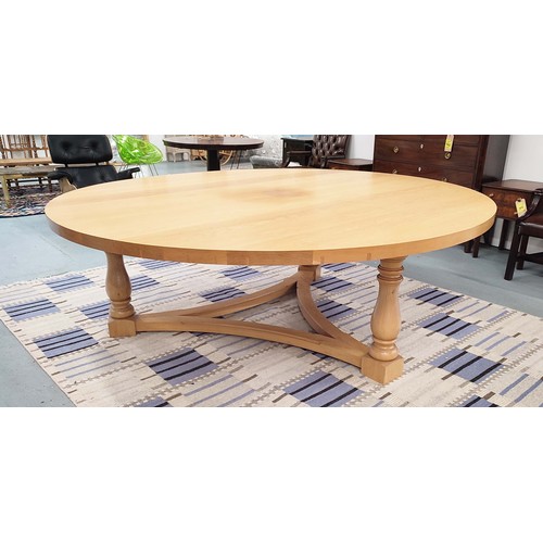 311 - DINING CENTRE TABLE, hand joined oak with circular top on tripartite baluster columns and shared str... 