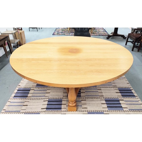 311 - DINING CENTRE TABLE, hand joined oak with circular top on tripartite baluster columns and shared str... 