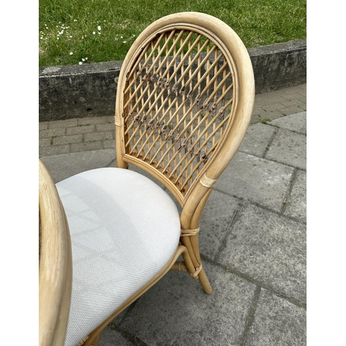 474 - ORANGERY STYLE TABLE, circular rattan and cane bound with glazed top together with four matching sid... 