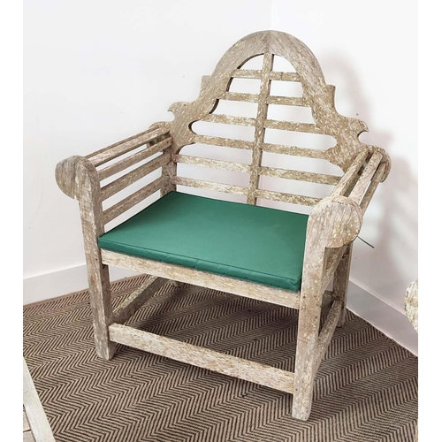 102 - GARDEN CHAIRS, a pair, Lutyens style, in weathered teak, each 90cm x 106cm H with green cushions alo... 