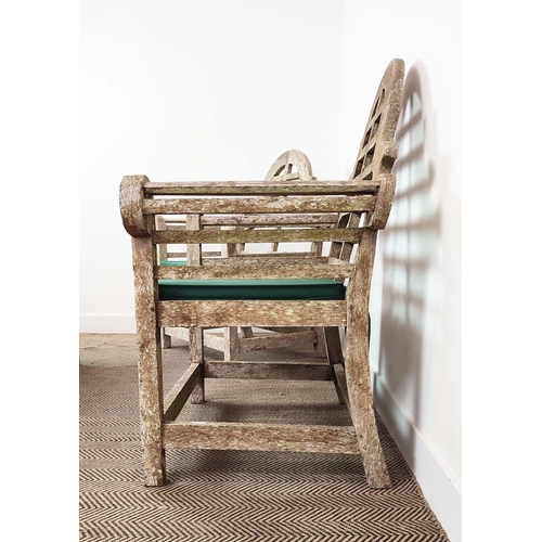 102 - GARDEN CHAIRS, a pair, Lutyens style, in weathered teak, each 90cm x 106cm H with green cushions alo... 