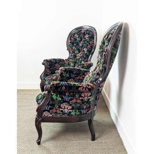 114 - ARMCHAIRS, a pair, Victorian style with spoon backs in black patterned velvet, 112cm H x 79cm. (2)