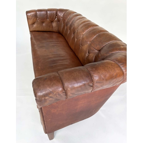 129 - DANISH SOFA, early 20th century Art Deco Danish button tan hide leather with arched back, rounded ar... 