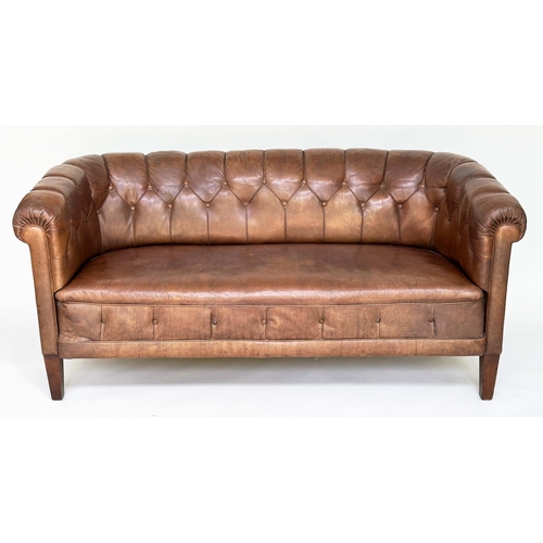 129 - DANISH SOFA, early 20th century Art Deco Danish button tan hide leather with arched back, rounded ar... 