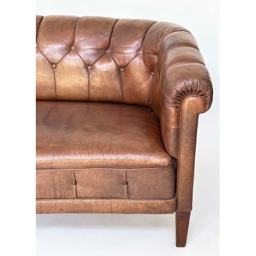 129 - DANISH SOFA, early 20th century Art Deco Danish button tan hide leather with arched back, rounded ar... 