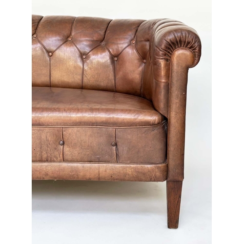 129 - DANISH SOFA, early 20th century Art Deco Danish button tan hide leather with arched back, rounded ar... 