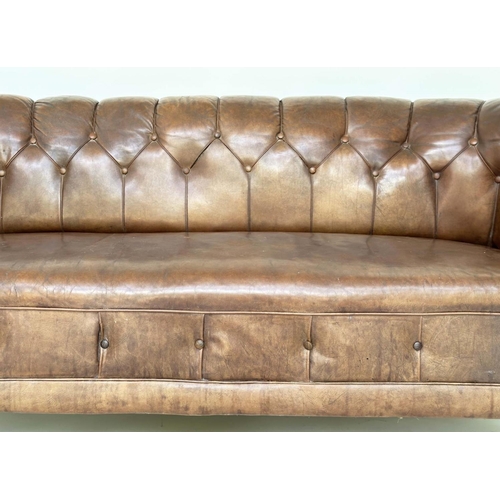 129 - DANISH SOFA, early 20th century Art Deco Danish button tan hide leather with arched back, rounded ar... 