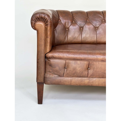 129 - DANISH SOFA, early 20th century Art Deco Danish button tan hide leather with arched back, rounded ar... 