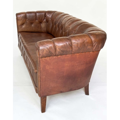 129 - DANISH SOFA, early 20th century Art Deco Danish button tan hide leather with arched back, rounded ar... 