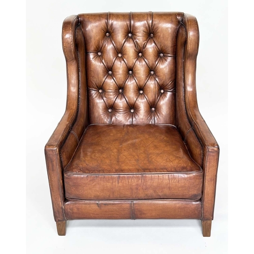 131 - LIBRARY ARMCHAIR, hand finished soft tan brown leather upholstered with button back and brass studdi... 