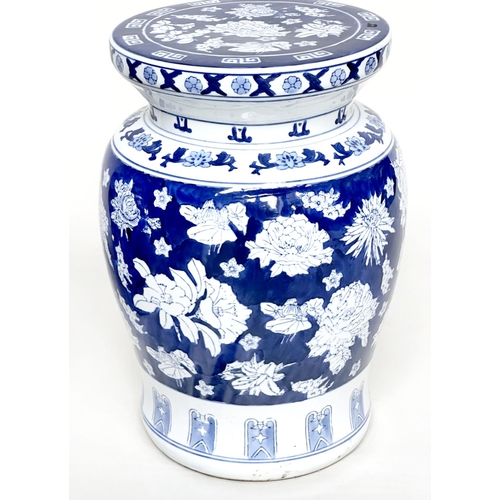 135 - CHINESE STOOLS, a pair, Chinese blue and white ceramic of vase form with fruiting vines and flowers,... 