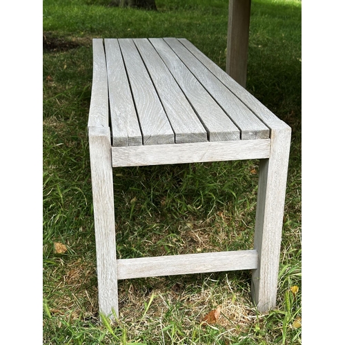 155 - PANAMA GARDEN BENCHES AND TABLE, a pair, rectangular well weathered slatted teak together with match... 