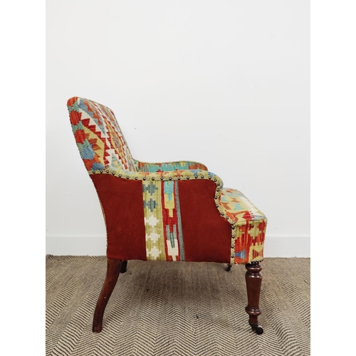 159 - ARMCHAIR, 19th century beechwood in kilim and corduroy with front castors, 87cm H x 66cm x 74cm.