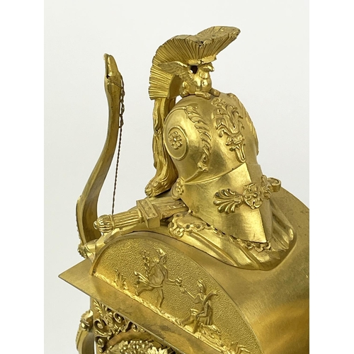 16 - MANTLE CLOCK, 19th century French Empire gilt bronze, with Diana the huntress figure holding an appl... 