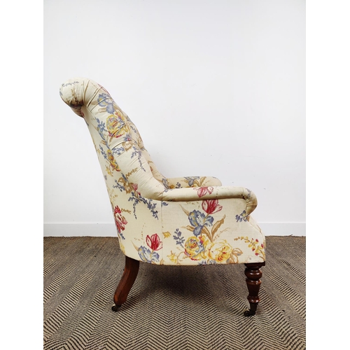 163 - BEAUMONT AND FLETCHER ARMCHAIR, cream and floral upholstery on brass castors, 98cm H x 68cm.