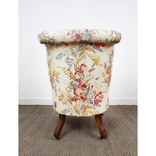 163 - BEAUMONT AND FLETCHER ARMCHAIR, cream and floral upholstery on brass castors, 98cm H x 68cm.