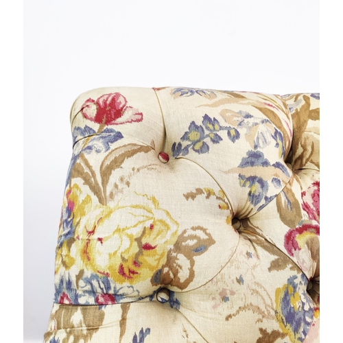 163 - BEAUMONT AND FLETCHER ARMCHAIR, cream and floral upholstery on brass castors, 98cm H x 68cm.