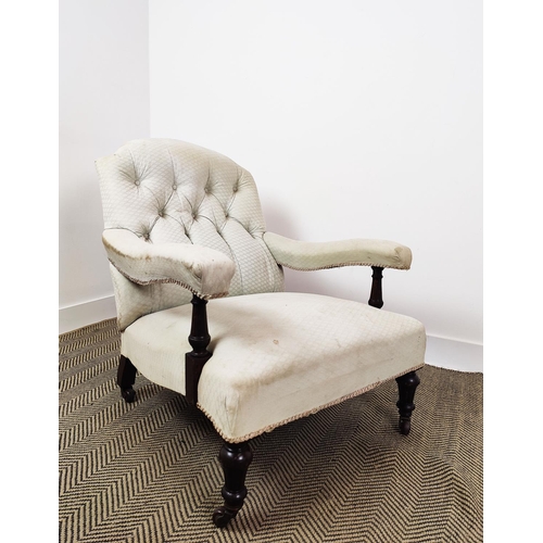 167 - ARMCHAIR, Victorian oak in white upholstery on ceramic castors, 85cm H x 77cm W x 92cm D.