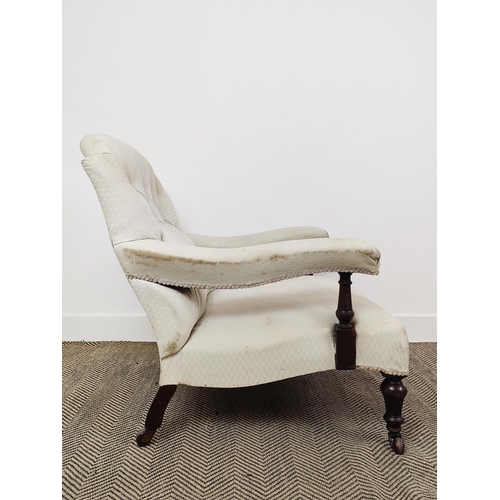 167 - ARMCHAIR, Victorian oak in white upholstery on ceramic castors, 85cm H x 77cm W x 92cm D.