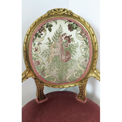 200 - FAUTEUIL, Louis XVI style giltwood in pink and floral upholstery, 96cm H x 60cm W x 64cm D.