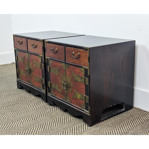 212 - BEDSIDE CABINETS, a pair, Korean elm and brass bound, each with two drawers and two doors, 42cm H x ... 