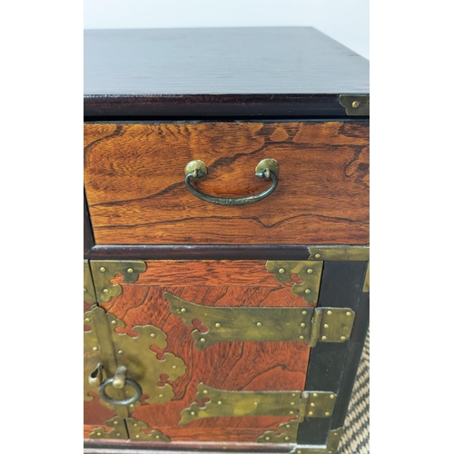 212 - BEDSIDE CABINETS, a pair, Korean elm and brass bound, each with two drawers and two doors, 42cm H x ... 