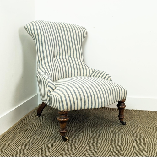 226 - SLIPPER CHAIR, mid Victorian walnut in striped Guy Goodfellow fabric on ceramic castors, 81cm H x 59... 