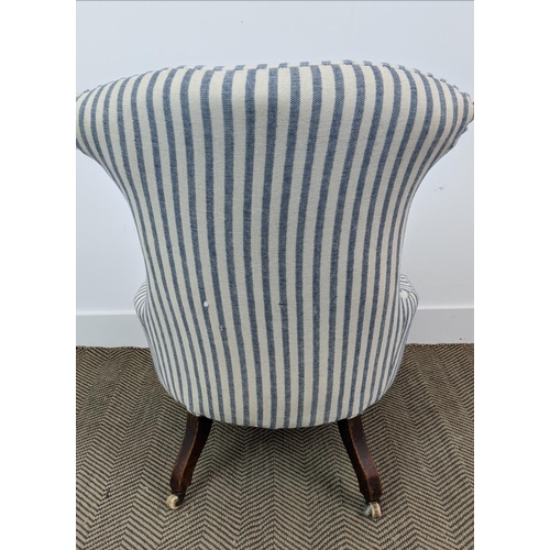 226 - SLIPPER CHAIR, mid Victorian walnut in striped Guy Goodfellow fabric on ceramic castors, 81cm H x 59... 