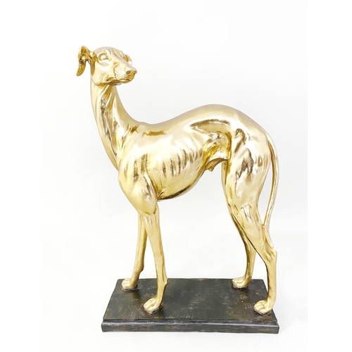 311 - CONTEMPORARY SCHOOL WHIPPET SCULPTURE, gilt finish resin, 66cm H x 43cm W x 14cm D