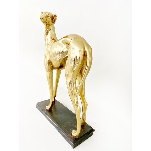 311 - CONTEMPORARY SCHOOL WHIPPET SCULPTURE, gilt finish resin, 66cm H x 43cm W x 14cm D