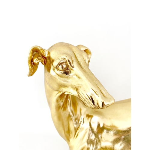 311 - CONTEMPORARY SCHOOL WHIPPET SCULPTURE, gilt finish resin, 66cm H x 43cm W x 14cm D