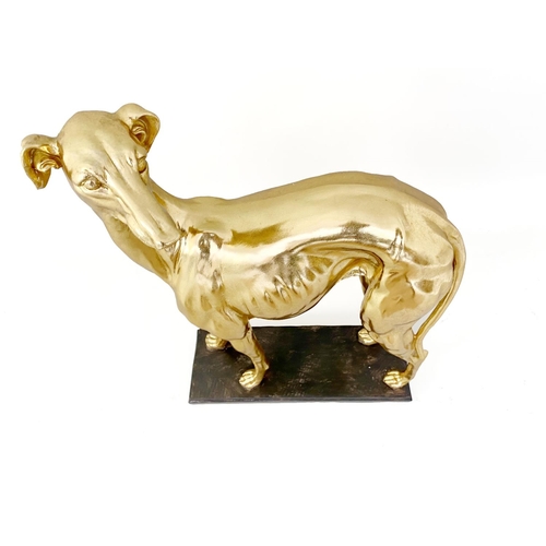 311 - CONTEMPORARY SCHOOL WHIPPET SCULPTURE, gilt finish resin, 66cm H x 43cm W x 14cm D