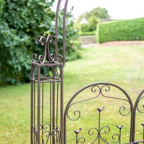 320 - ARCHITECTURAL GARDEN GATE, wrought metal Regency style, 255cm H x 147cm x 23cm.