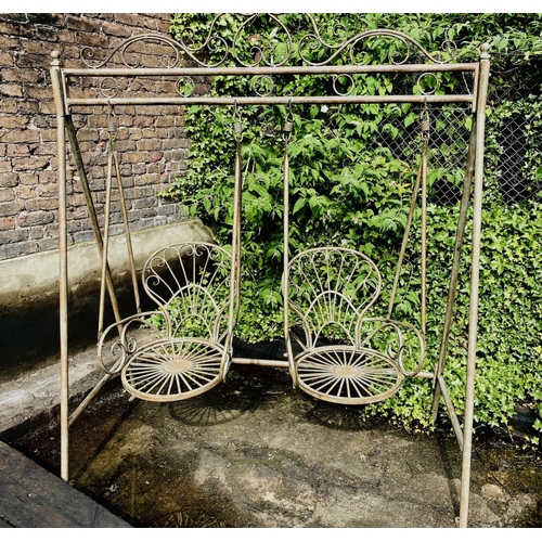 321 - ARCHITECTURAL GARDEN SWING, Regency style, wrought metal with a faux verdegris finish, 220cm H x 180... 