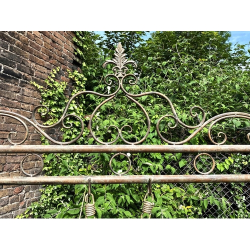 321 - ARCHITECTURAL GARDEN SWING, Regency style, wrought metal with a faux verdegris finish, 220cm H x 180... 