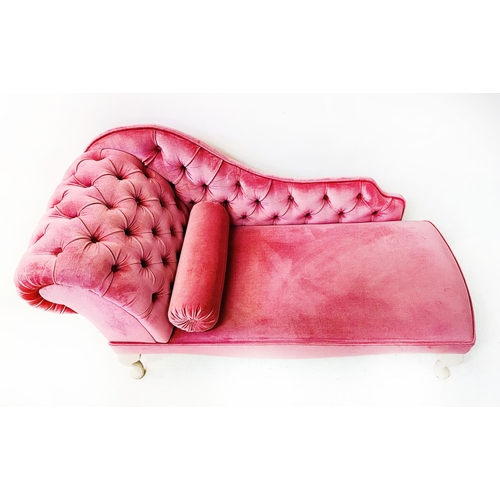 343 - CHAISE LONGUE, pink buttoned back upholstery with bolster cushion, 140cm L x 74cm H x 58cm W