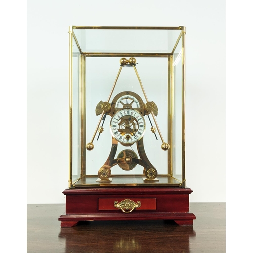 363 - SKELETON CLOCK, gilt metal in a glazed case, 55cm H x 33cm x 22cm.