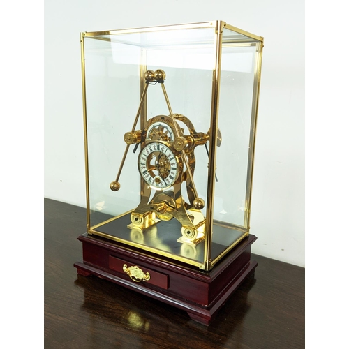 363 - SKELETON CLOCK, gilt metal in a glazed case, 55cm H x 33cm x 22cm.