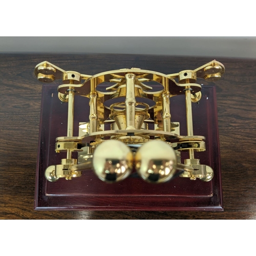 363 - SKELETON CLOCK, gilt metal in a glazed case, 55cm H x 33cm x 22cm.