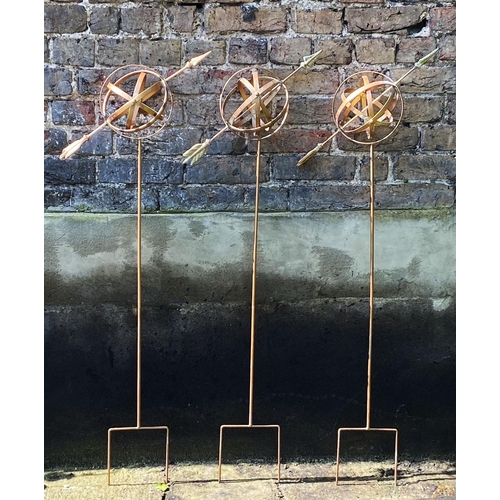 370 - ARMILLARY SPHERE GARDEN STAKES, a set of three, 115cm H x 39cm x 16cm. (3)