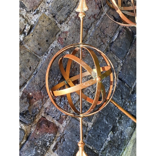 370 - ARMILLARY SPHERE GARDEN STAKES, a set of three, 115cm H x 39cm x 16cm. (3)