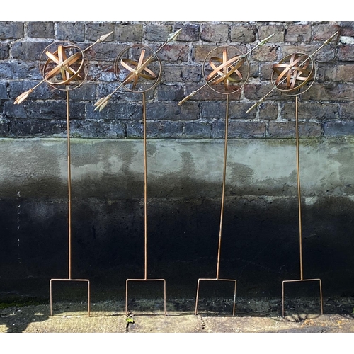 370 - ARMILLARY SPHERE GARDEN STAKES, a set of three, 115cm H x 39cm x 16cm. (3)