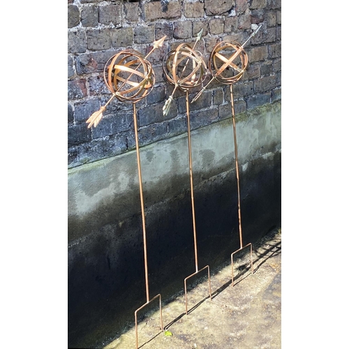 370 - ARMILLARY SPHERE GARDEN STAKES, a set of three, 115cm H x 39cm x 16cm. (3)