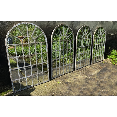 371 - ARCHITECTURAL GARDEN MIRRORS, a set of four, regency style arched metal frames in a weathered finish... 