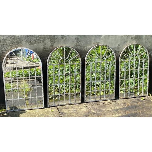 371 - ARCHITECTURAL GARDEN MIRRORS, a set of four, regency style arched metal frames in a weathered finish... 