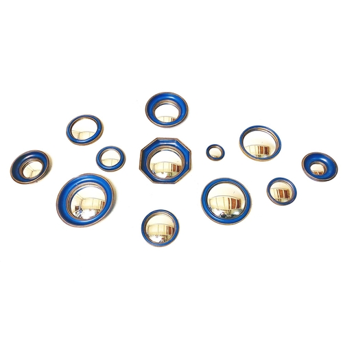 376 - CONVEX WALL MIRRORS, a set of twelve, blue and gilt frames, various sizes and shapes, 26cm diam. at ... 