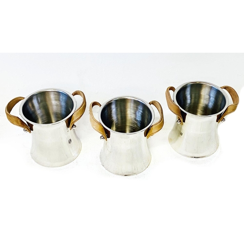 385 - WINE COOLERS, a set of three, polished metal, 20cm H x 24cm x 18cm. (3)