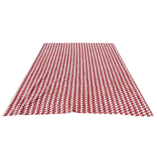 387 - OKA RUG, red and white dark woven pattern, 300cm x 240cm.